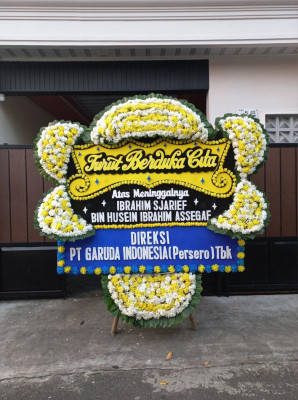 Papan Bunga Duka di Raveni Rara