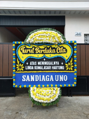 Papan Bunga Duka di Raveni Rara